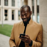 employee logging into their payroll account on their phone